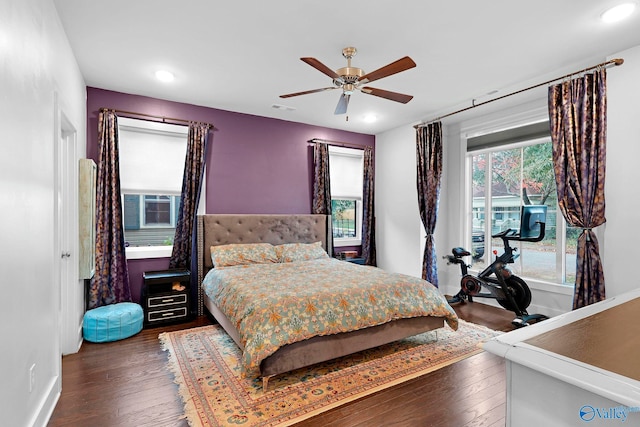 bedroom featuring ceiling fan, recessed lighting, visible vents, baseboards, and wood-type flooring