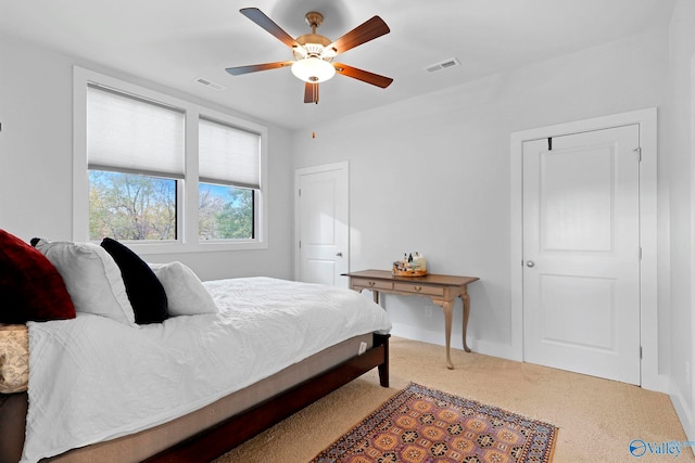 bedroom featuring visible vents and ceiling fan