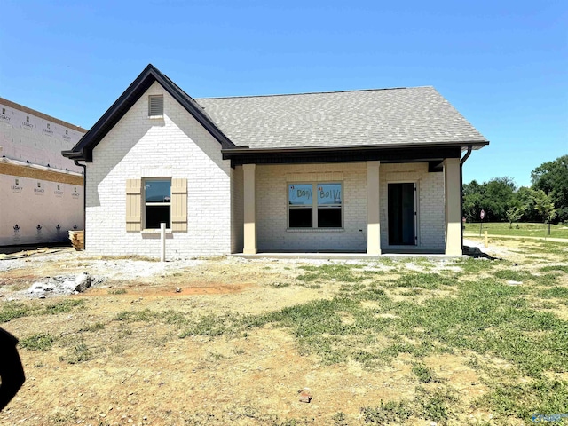 17437 Brooklawn St, Athens, AL 35611 - rear view of house featuring brick siding and roof with shingles