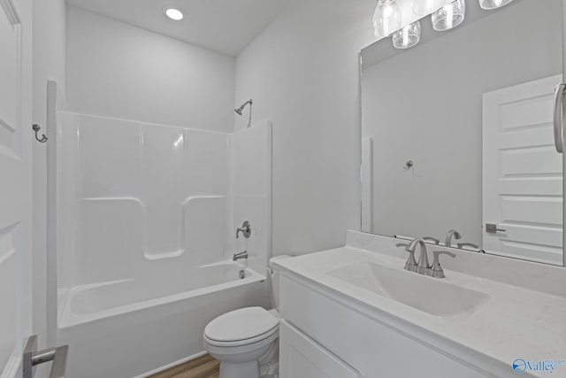 17437 Brooklawn St, Athens, AL 35611 - bathroom with vanity, toilet,  shower combination, wood finished floors, and recessed lighting