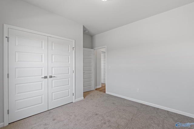 17437 Brooklawn St, Athens, AL 35611 - unfurnished bedroom featuring carpet, baseboards, and a closet
