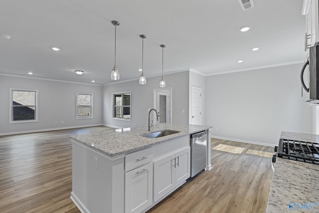17437 Brooklawn St, Athens, AL 35611 - kitchen featuring stainless steel appliances, a sink, ornamental molding, white cabinets, and light wood-style floors