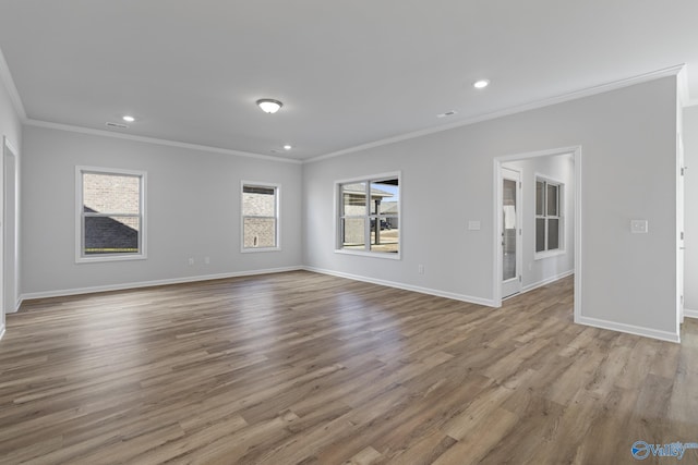 17437 Brooklawn St, Athens, AL 35611 - spare room with ornamental molding, wood finished floors, baseboards, and recessed lighting