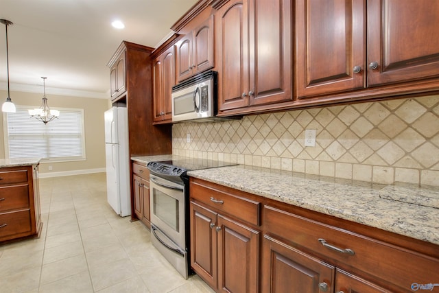 kitchen featuring ornamental molding, hanging light fixtures, light stone countertops, and stainless steel appliances