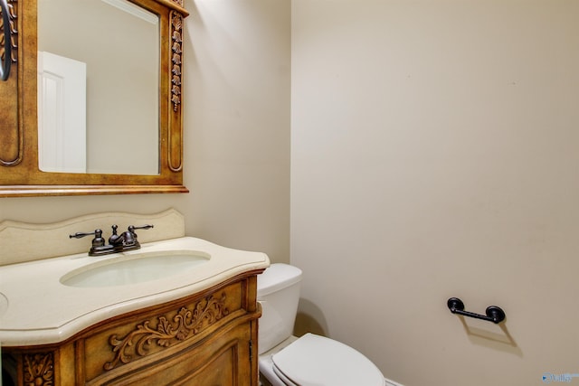 half bath with toilet and vanity