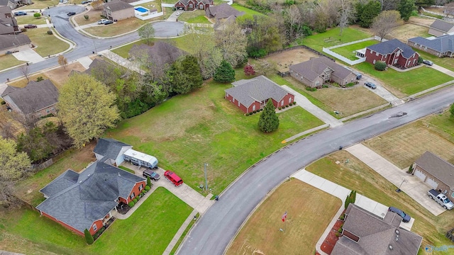 birds eye view of property with a residential view