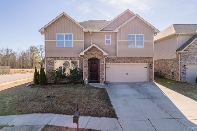 view of front of property featuring cooling unit, a front lawn, and a garage