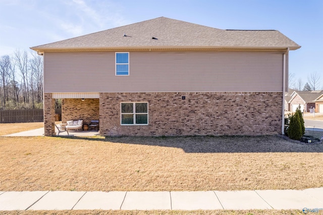 view of side of property with a patio