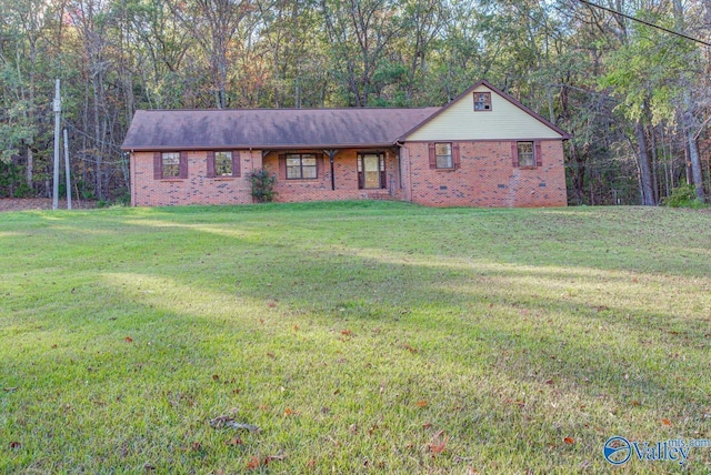 single story home featuring crawl space, a front lawn, and brick siding