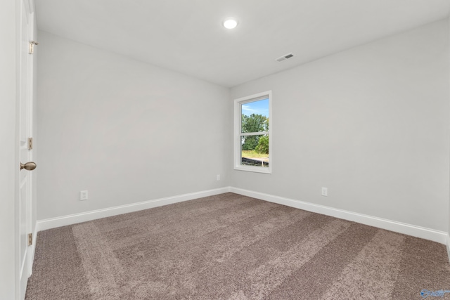 view of carpeted spare room