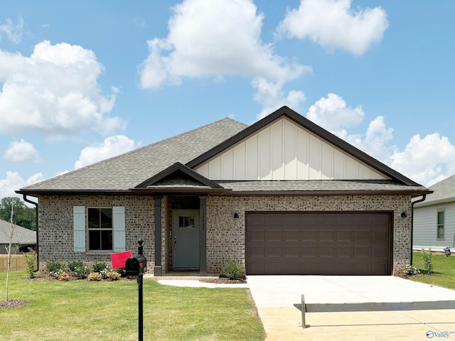 view of front facade with driveway, a front lawn, board and batten siding, a garage, and brick siding