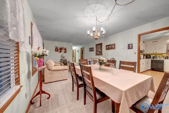 carpeted dining area featuring a textured ceiling and a notable chandelier