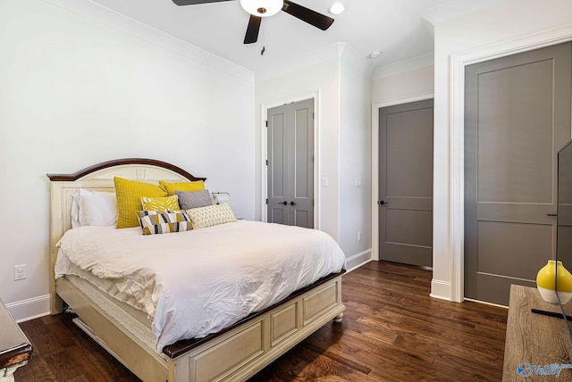 bedroom with baseboards, dark wood finished floors, and ceiling fan
