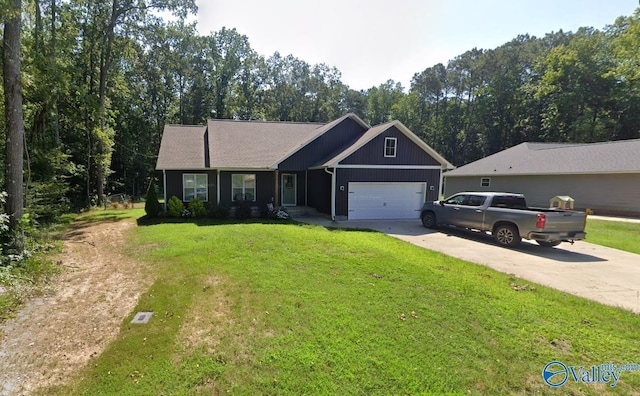 ranch-style home featuring a garage and a front yard