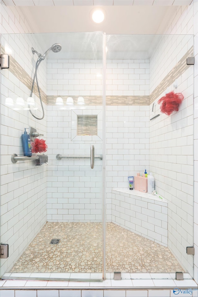 bathroom featuring a stall shower