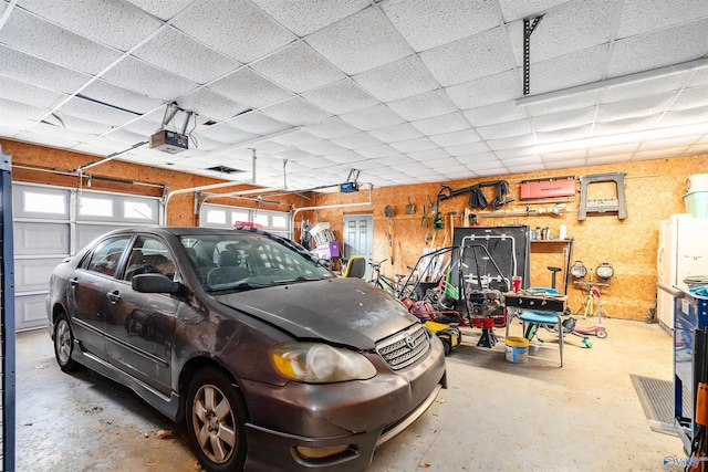 garage featuring a garage door opener