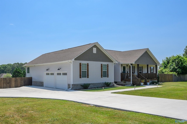 ranch-style home featuring a porch and a front lawn