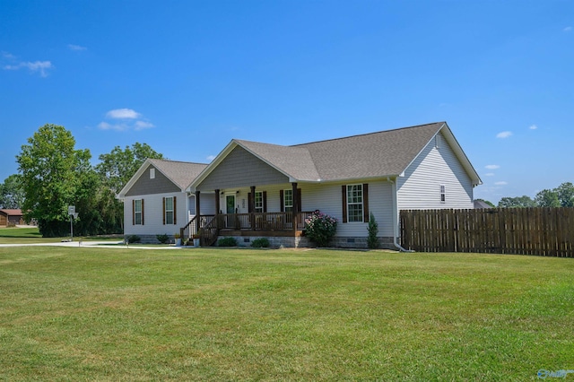 view of front facade with a front yard and a porch