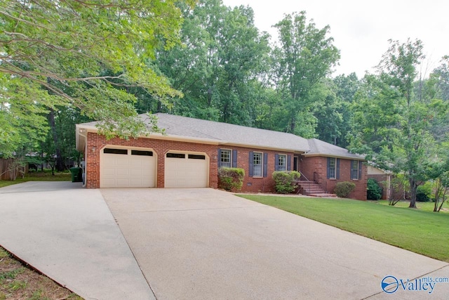 2703 Box Canyon Rd SE, Huntsville, AL 35803 - ranch-style home featuring an attached garage, brick siding, driveway, and a front lawn