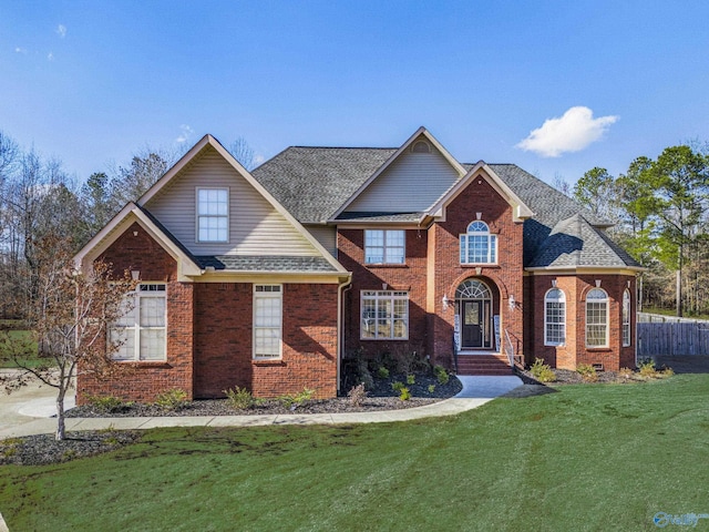 view of front property with a front lawn