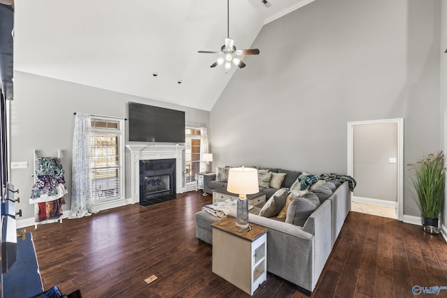 living room featuring hardwood / wood-style flooring, high vaulted ceiling, and ceiling fan