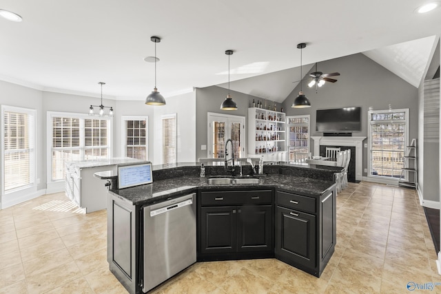 kitchen featuring a large island, sink, decorative light fixtures, and dishwasher