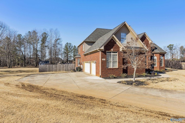 view of side of property featuring a garage