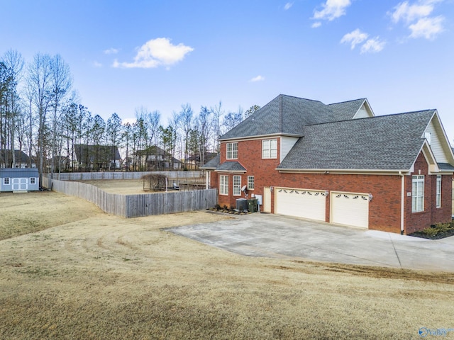 view of side of home with a garage