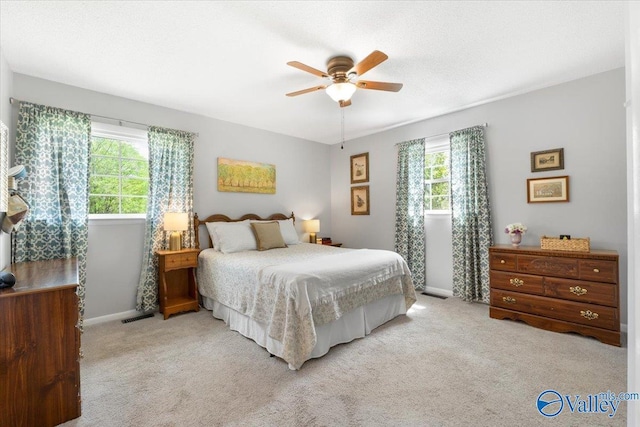1762 Old Big Cove Rd SE, Owens Cross Roads, AL 35763 - carpeted bedroom featuring visible vents, baseboards, and ceiling fan