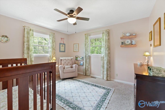 1762 Old Big Cove Rd SE, Owens Cross Roads, AL 35763 - bedroom with light carpet, visible vents, baseboards, and a textured ceiling