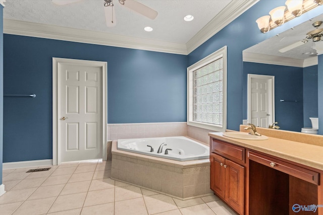 bathroom featuring crown molding, vanity, ceiling fan, a whirlpool tub, and tile patterned floors