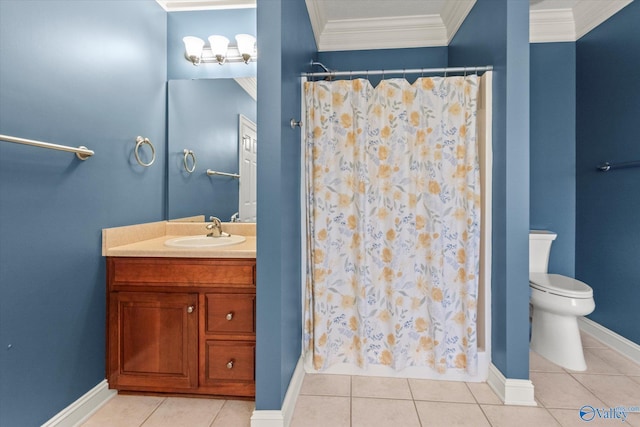 full bathroom featuring tile patterned flooring, ornamental molding, vanity, toilet, and baseboards