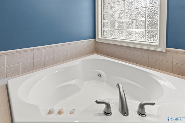 bathroom with a jetted tub