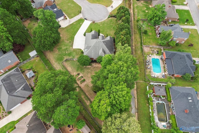 birds eye view of property with a residential view