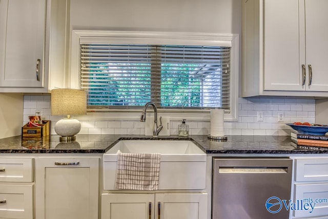 kitchen featuring dark stone counters, sink, decorative backsplash, and dishwasher