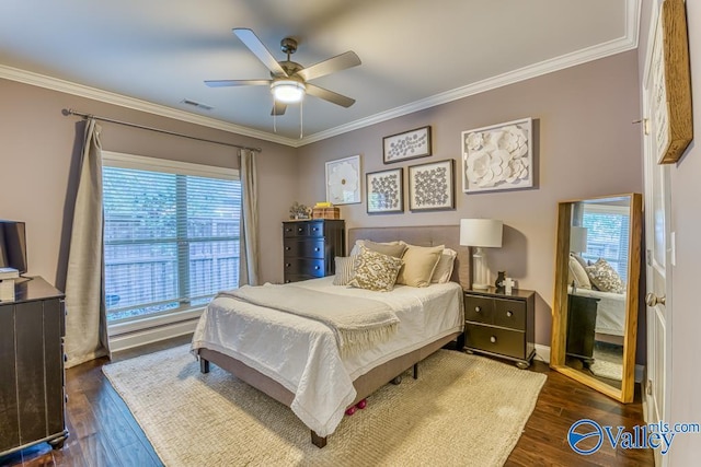 bedroom featuring ceiling fan, dark wood-type flooring, and crown molding