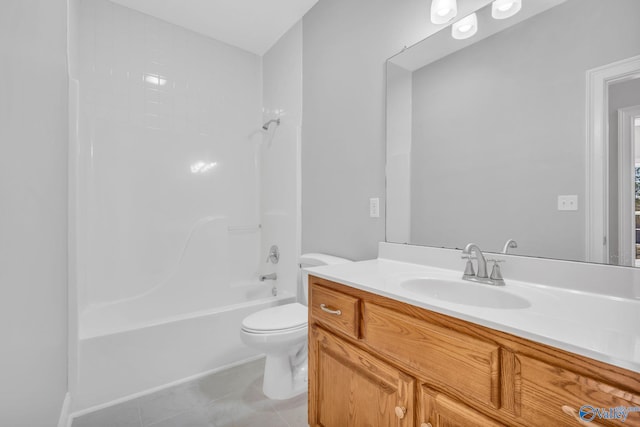 full bathroom with toilet, bathtub / shower combination, vanity, and tile patterned floors