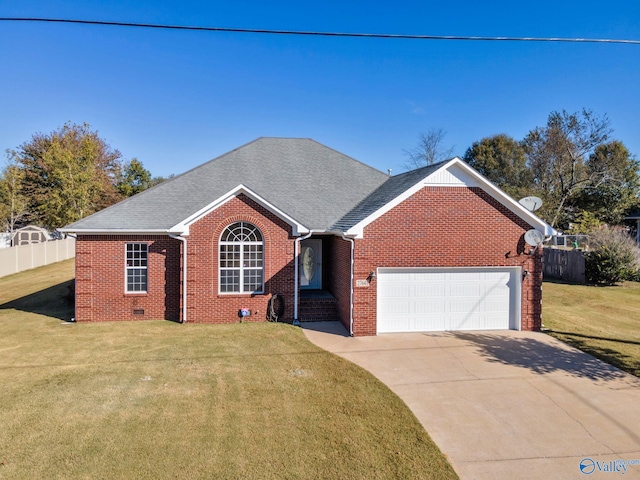 single story home featuring a garage and a front lawn