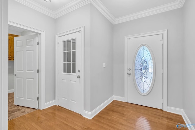 entryway with crown molding and wood-type flooring