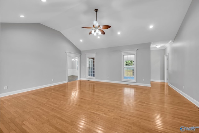 unfurnished living room with vaulted ceiling, light hardwood / wood-style flooring, and ceiling fan