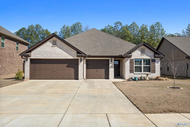 view of front of home featuring a shingled roof, brick siding, and an attached garage