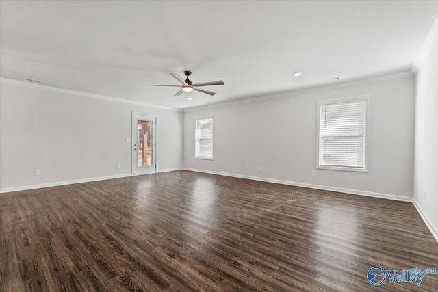 138 Barlow Way, Owens Cross Roads, AL 35763 - spare room featuring baseboards, dark wood-type flooring, and crown molding