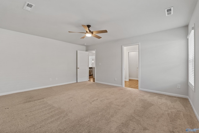 138 Barlow Way, Owens Cross Roads, AL 35763 - unfurnished bedroom featuring a ceiling fan, carpet flooring, visible vents, and baseboards