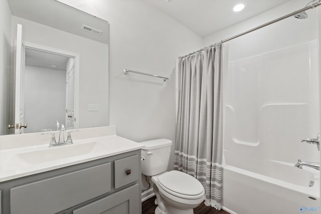 138 Barlow Way, Owens Cross Roads, AL 35763 - full bathroom featuring toilet, shower / tub combo, wood finished floors, vanity, and visible vents