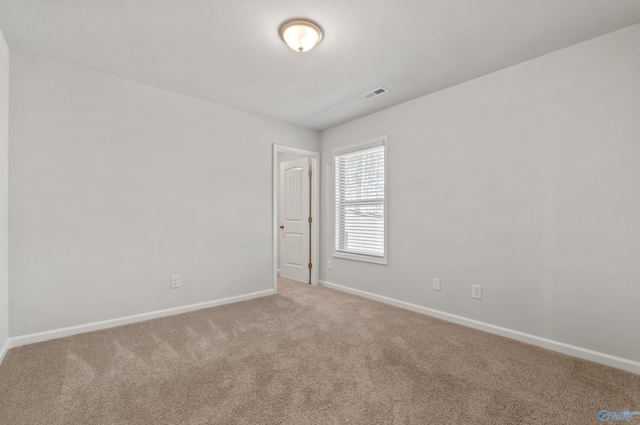 138 Barlow Way, Owens Cross Roads, AL 35763 - carpeted empty room featuring baseboards and visible vents