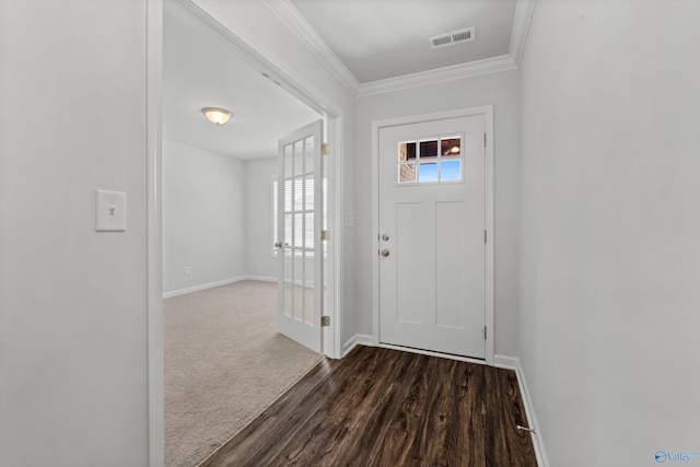 138 Barlow Way, Owens Cross Roads, AL 35763 - foyer featuring baseboards, visible vents, dark wood-type flooring, dark colored carpet, and crown molding