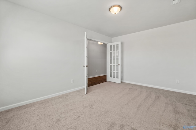138 Barlow Way, Owens Cross Roads, AL 35763 - carpeted empty room with baseboards and french doors