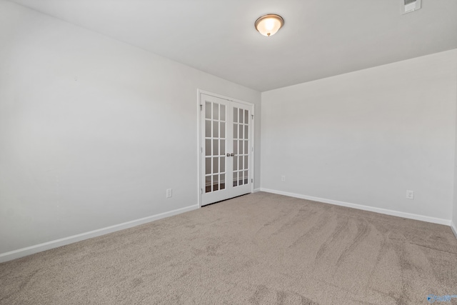 138 Barlow Way, Owens Cross Roads, AL 35763 - unfurnished room with french doors, carpet, visible vents, and baseboards