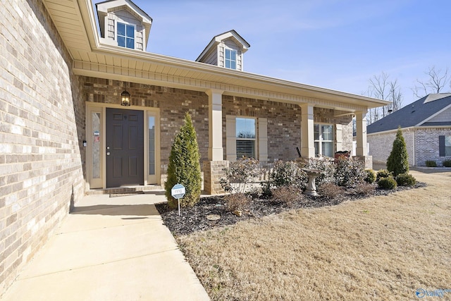 doorway to property with a porch