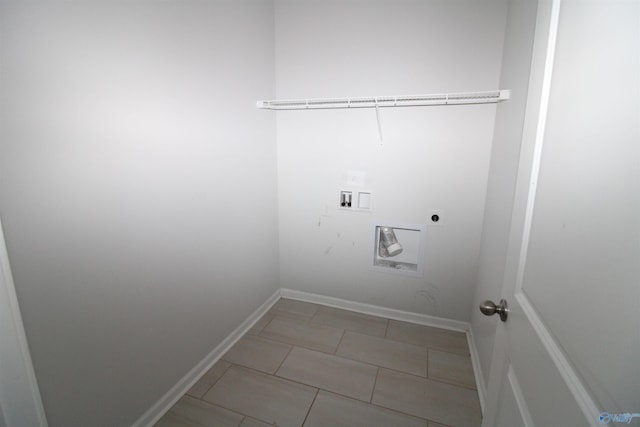 laundry room with tile patterned floors, electric dryer hookup, and hookup for a washing machine